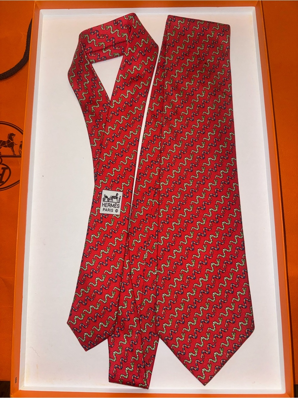 Hermes Red Silk Tie with Wavy Chain Motif